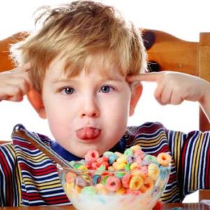 child eating cereal